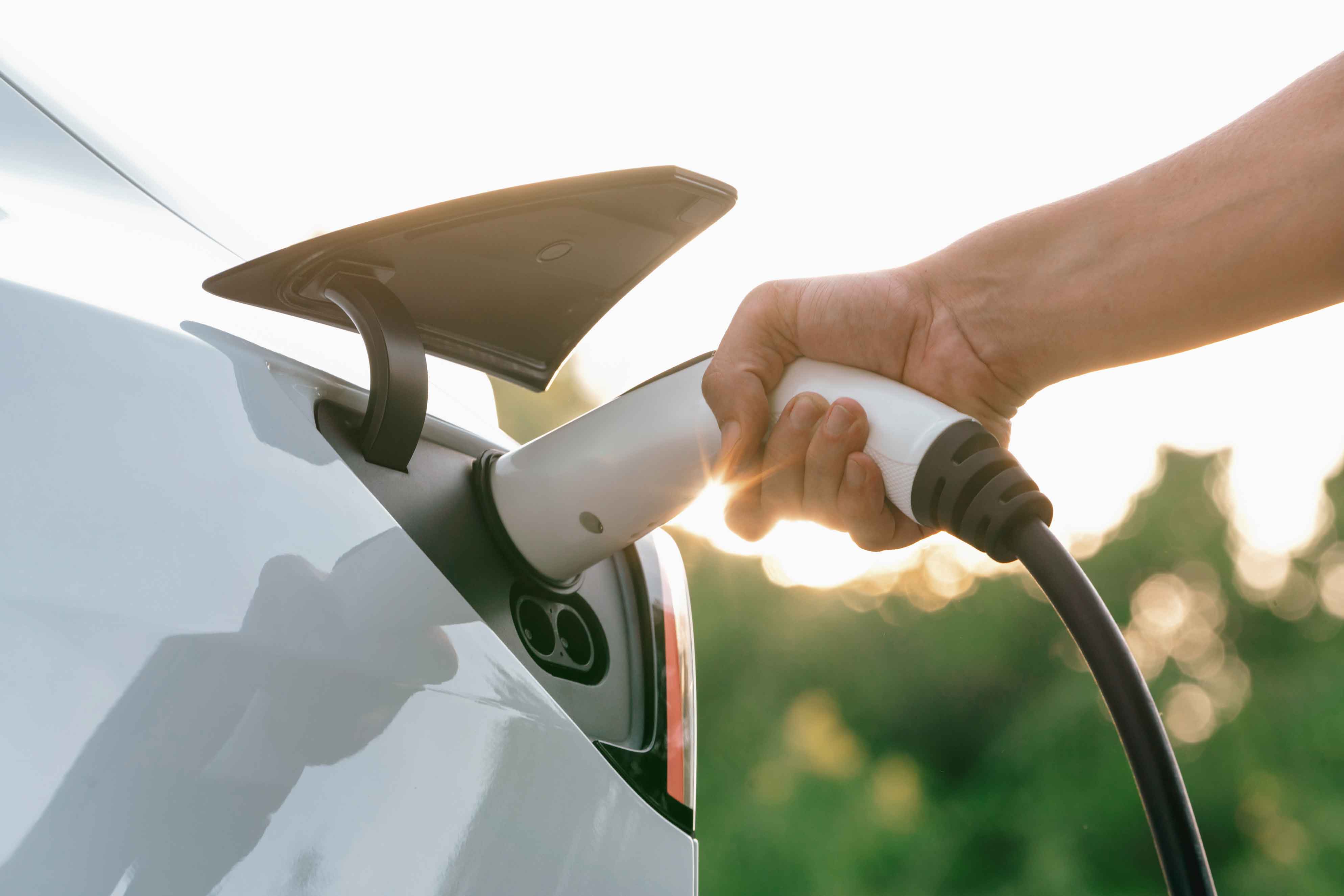 Sustainability –  Image of e-car being charged